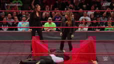 Ronda Rousey Signs Her WWE Contract At ELIMINATION CHAMBER And Puts Triple H Through A Table!