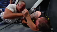 Shane McMahon Leaves Kevin Owens Unconscious Under The Announce Table On SMACKDOWN LIVE