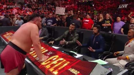 AJ Styles Defeats Samoa Joe In Controversial Fashion To Retain The WWE Championship At HELL IN A CELL