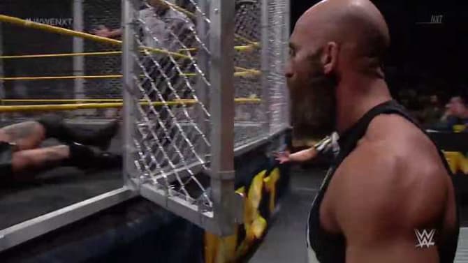 NXT: Johnny Gargano Defeats Aleister Black In A Steel Cage Match With The Help Of An Old Friend