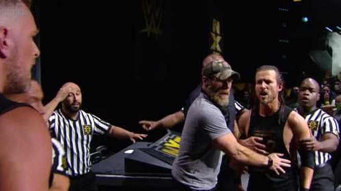 Pat McAfee Punt Kicks Adam Cole On NXT After Announce Table Confrontation