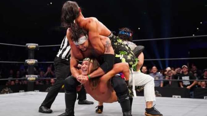 Proud & Powerful (Santana And Ortiz) Beats The Young Bucks At AEW's FULL GEAR