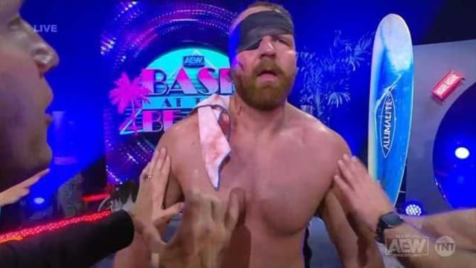 The Inner Circle Takes Out Jon Moxley At BASH AT THE BEACH; Chris Jericho Jams A Spike In His Eye