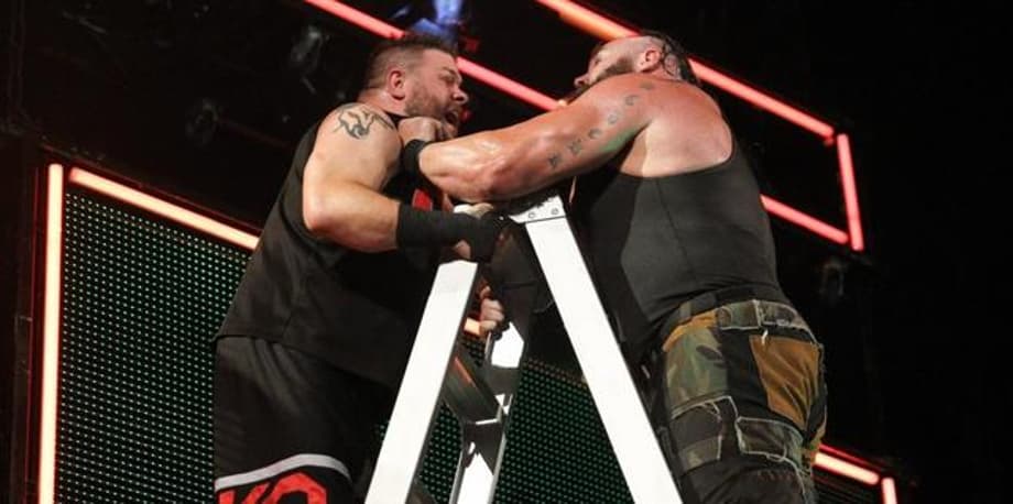 Watch Braun Strowman Throw Kevin Owens Off The Top Of A Giant Ladder At MONEY IN THE BANK