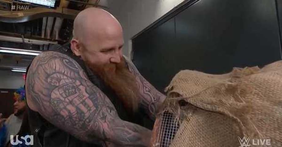Erick Rowan Finally Reveals What He's Been Carrying Around In That Cage On RAW