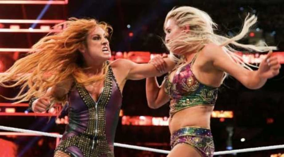 Former SMACKDOWN Women's Champion Becky Lynch Hits Charlotte Flair With A Stone Cold Stunner