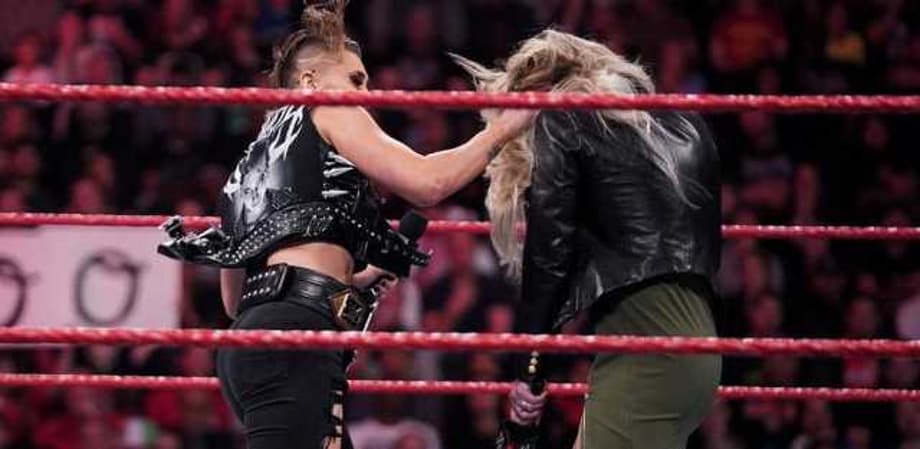 NXT Women's Champion Rhea Ripley Shows Up On RAW And Punches Charlotte Right In The Face