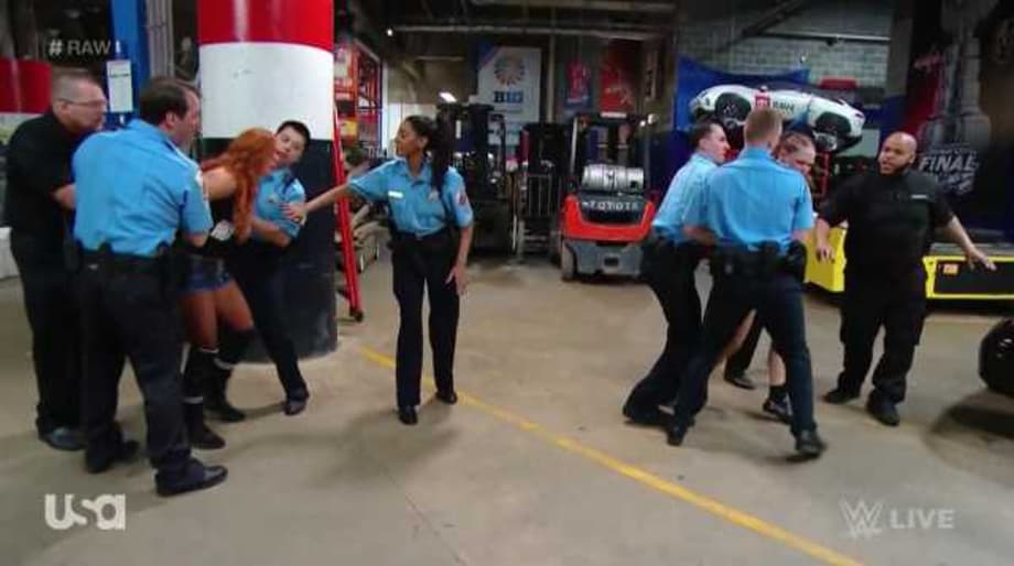 RAW Descended Into Chaos As Ronda Rousey, Becky Lynch And Charlotte Flair Brawled Backstage - In Handcuffs!