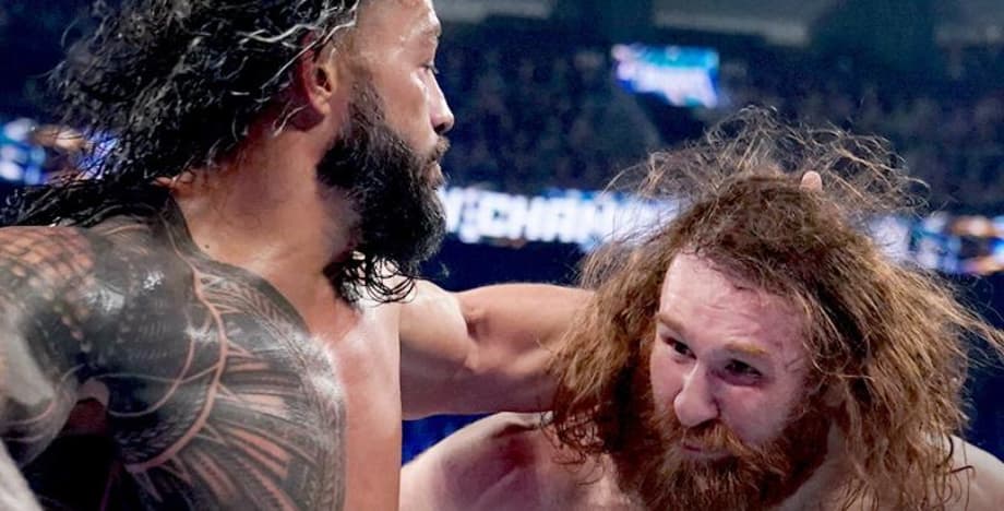 Roman Reigns Defeats Sami Zayn At ELIMINATION CHAMBER To Retain The WWE Universal Championship
