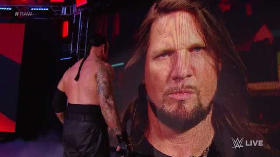 The Undertaker Takes Out Gallows And Anderson On RAW During WRESTLEMANIA Contract Signing