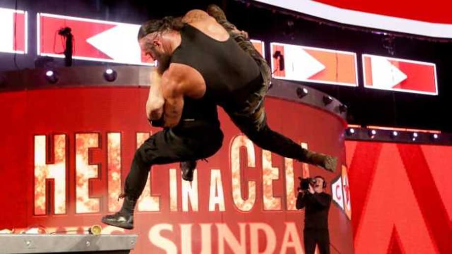 VIDEO: See Roman Reigns Take Out Braun Strowman By Putting Him Through A Table On RAW