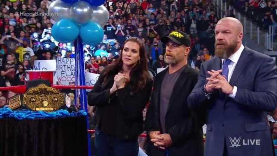 Batista Returns To RAW And Lays Out Ric Flair In A Bid To Get Triple H's Attention