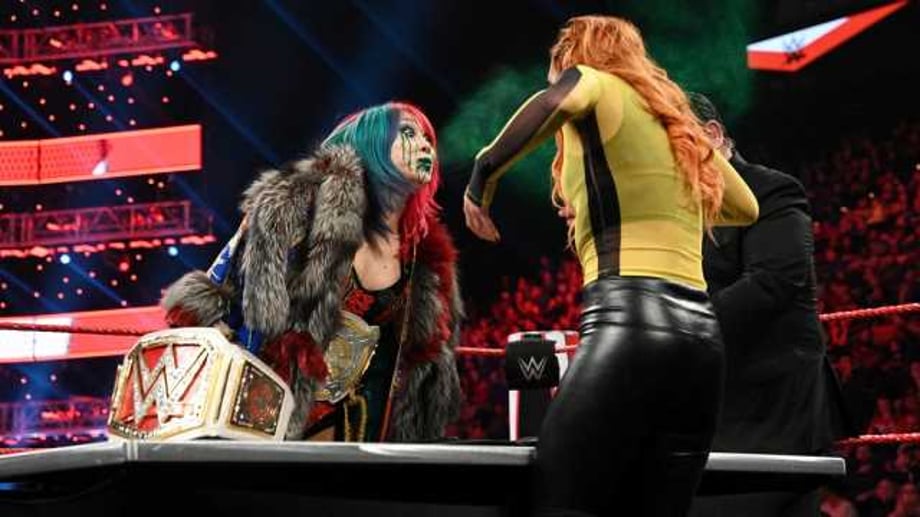 Becky Lynch Vows To Take Asuka "Down With Her" At The ROYAL RUMBLE After Getting Misted On RAW