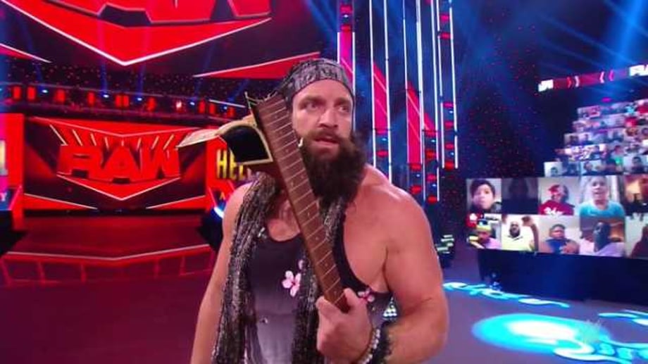 Elias Returns On RAW And Costs Jeff Hardy His Match By Smashing A Guitar Across His Back