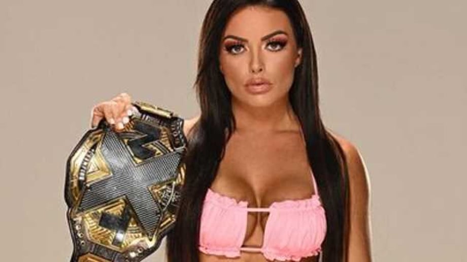 Mandy Rose Poses With Her NXT Women's Championship In Nothing More Than A Bikini For New Photoshoot