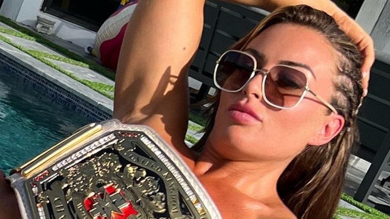 Mandy Rose Wears Nothing Except Her Nxt Unified Titles In Must See New Poolside Photo